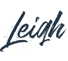 A logo with the word leigh on it.